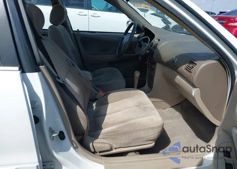 2001 Toyota Corolla Le from USA, damaged, VIN 1NXBR12E11Z546728